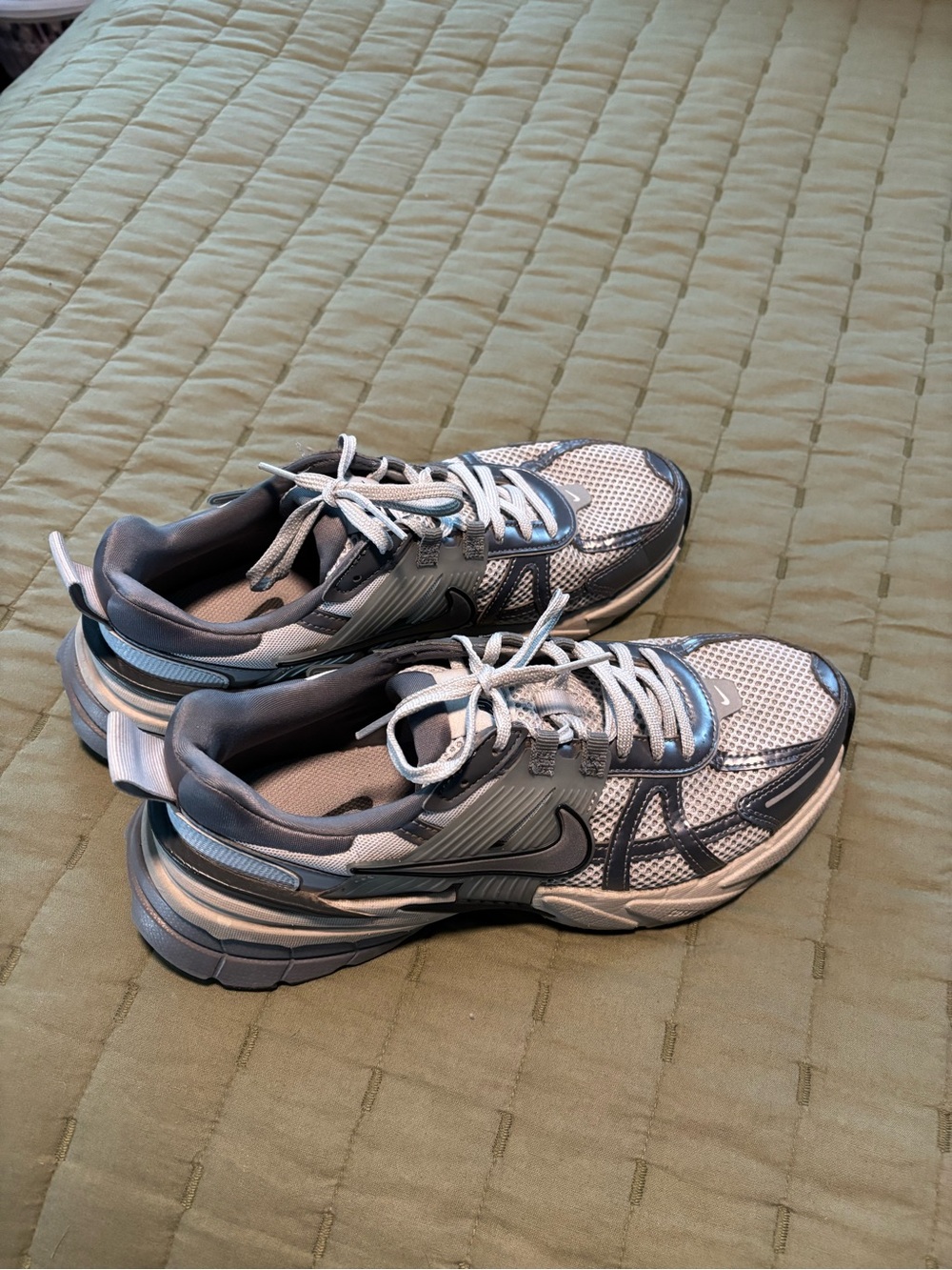 Nike Gray and Silver women’s tennis shoe